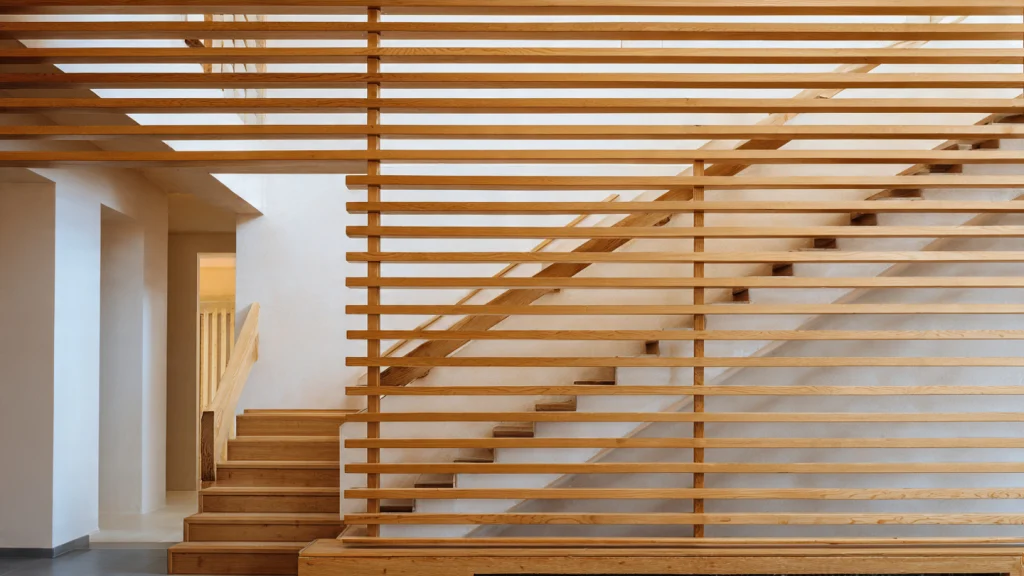 15 Stair Railing Ideas: Stylish, Modern & Creative Designs for Your Home 12 Horizontal Wood Slat Stair Railing